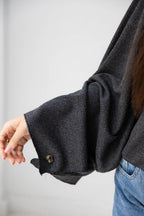 The Iconic Knit Cape in bluish grey