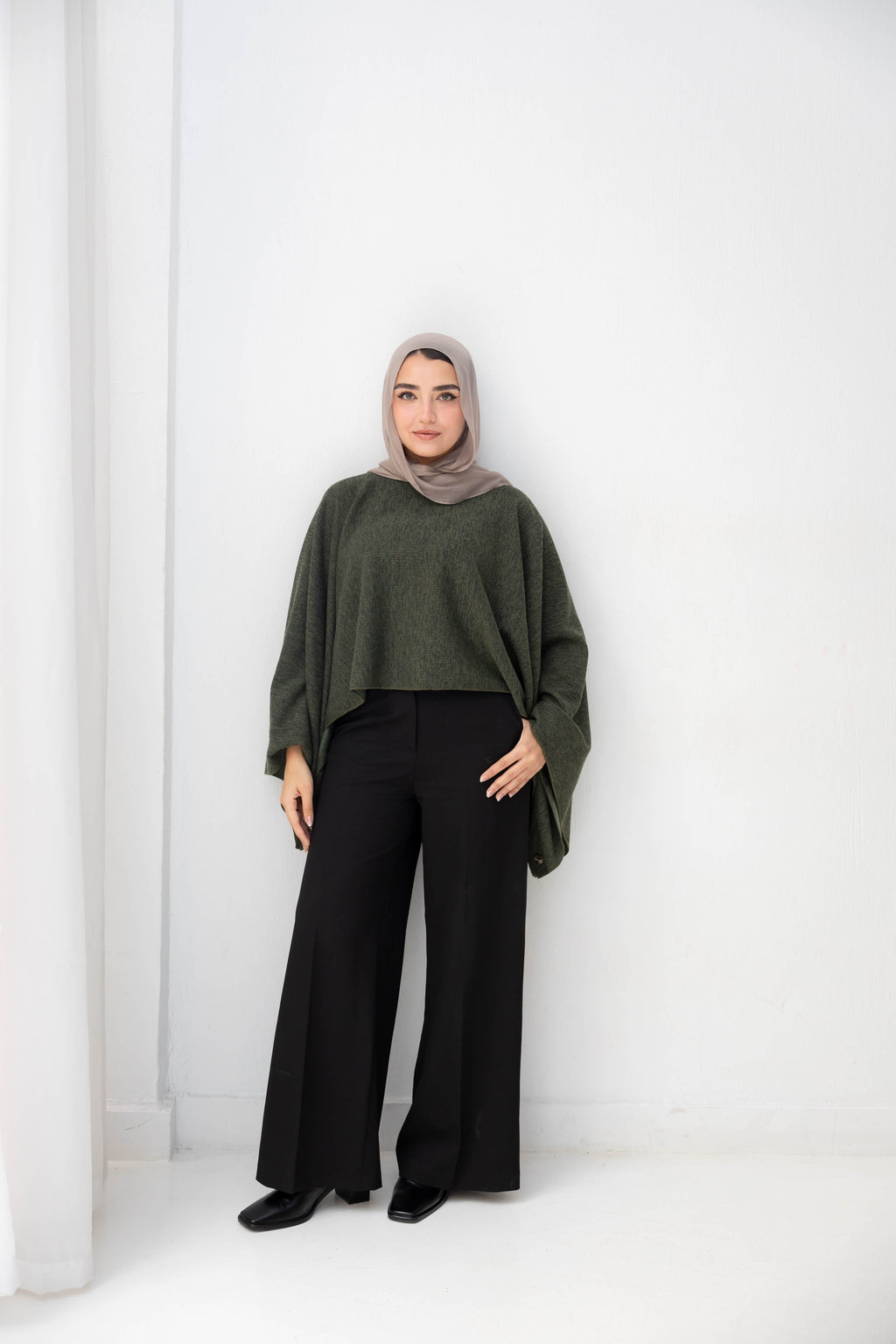 The Iconic Knit Cape in olive