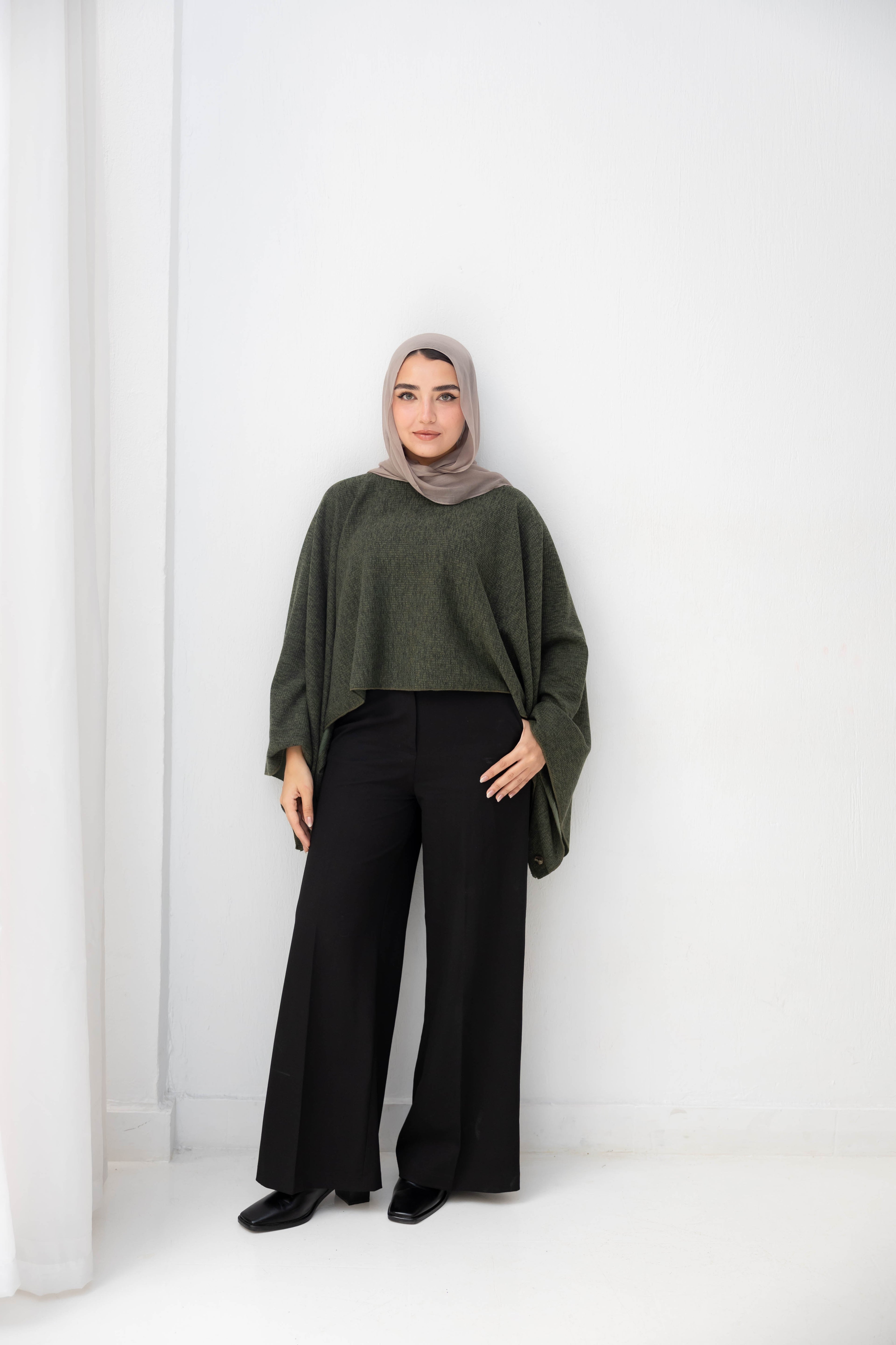 The Iconic Knit Cape in olive