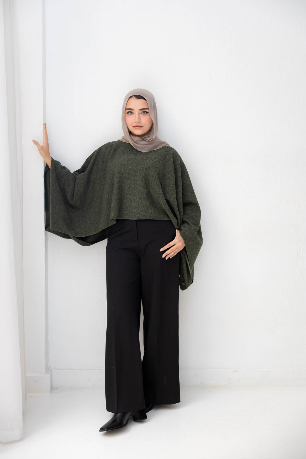 The Iconic Knit Cape in olive