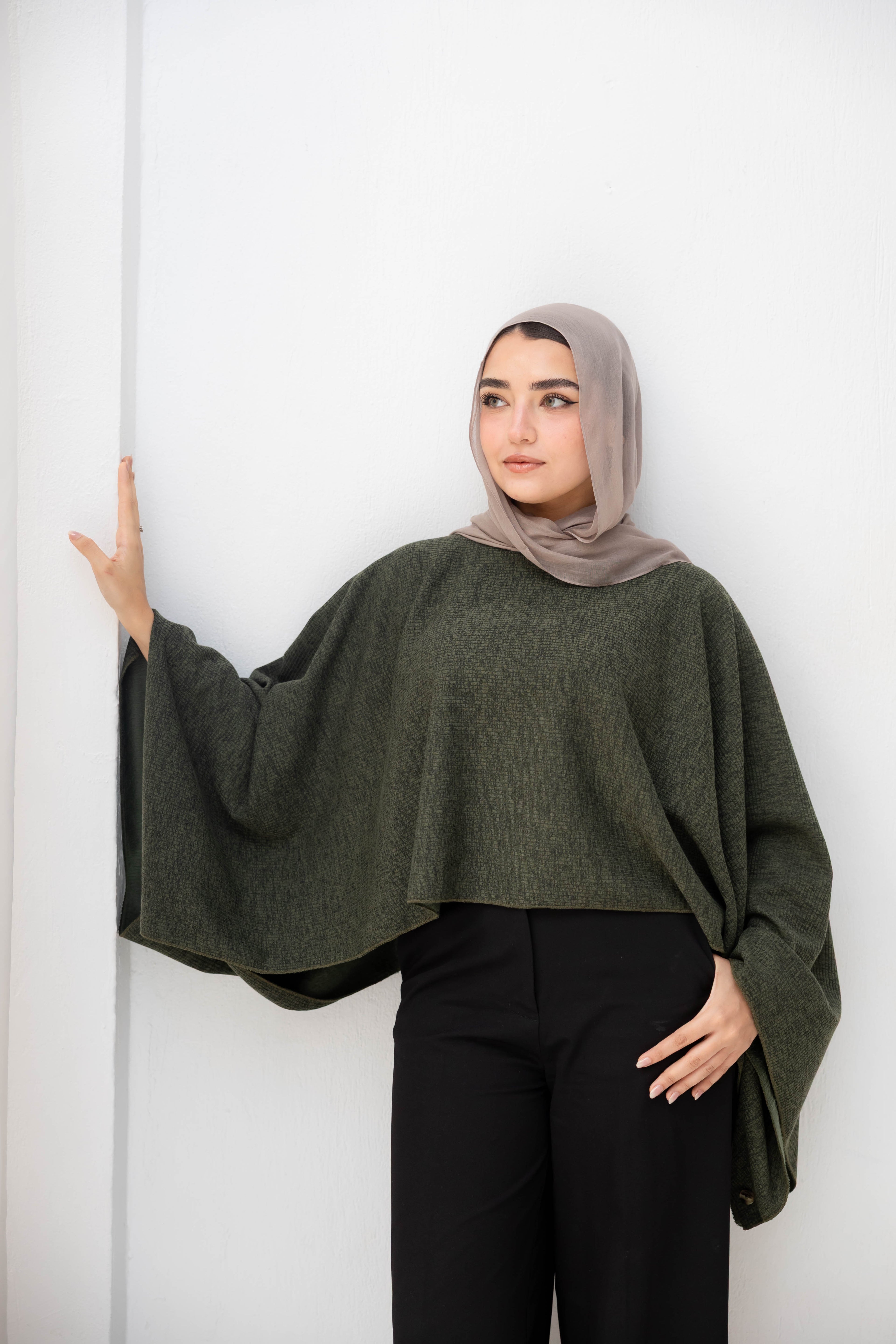 The Iconic Knit Cape in olive