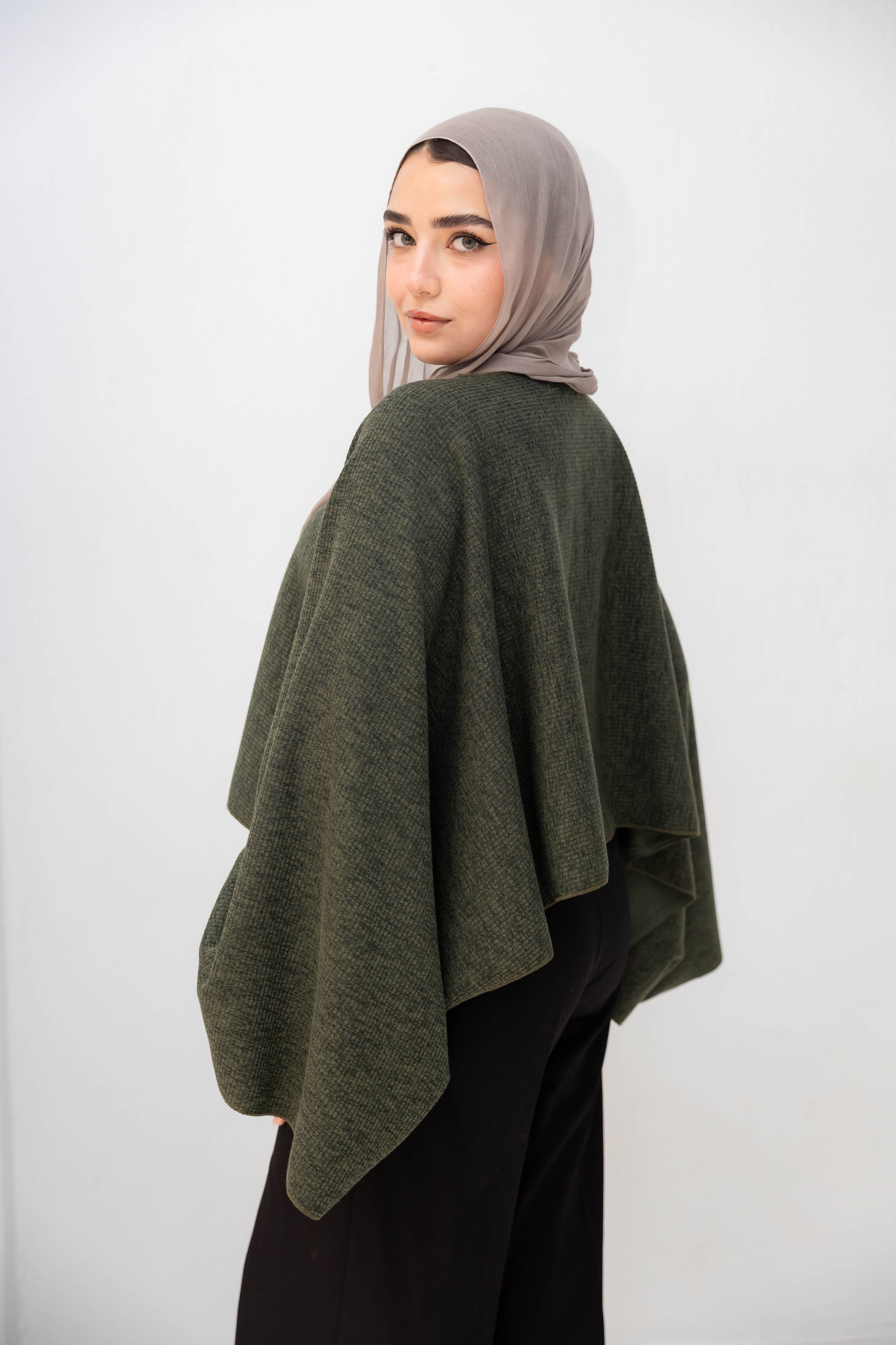 The Iconic Knit Cape in olive