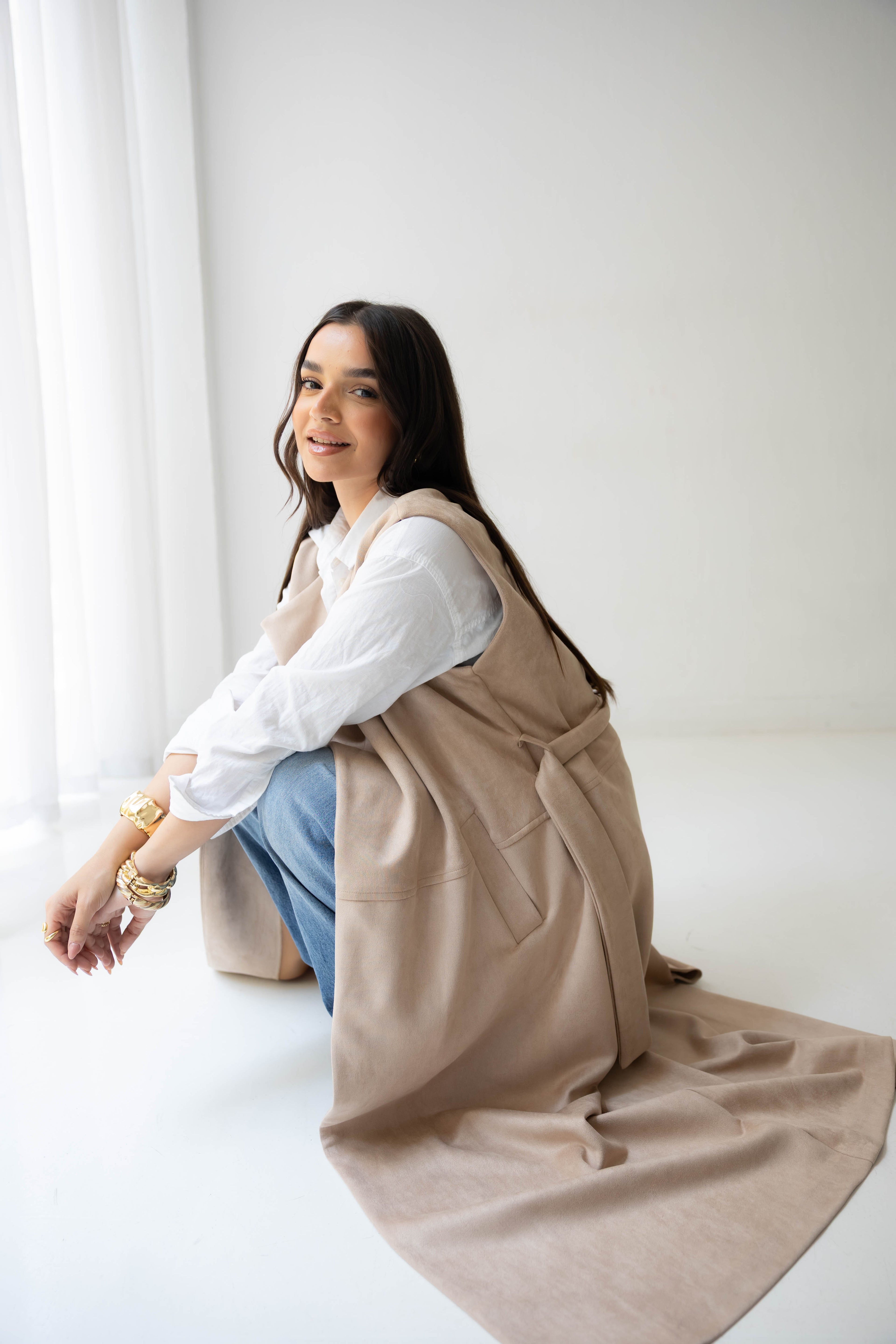 Suede longline sleeveless coat in beige